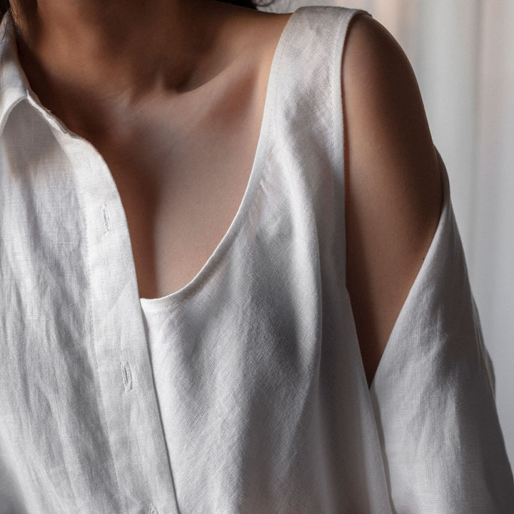 Close up of Hana Linen Dress in White on model.