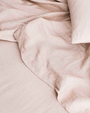 Cultiver blush swatch card with soft pink fabric samples on flat sheet, showcasing color options for interior decor.