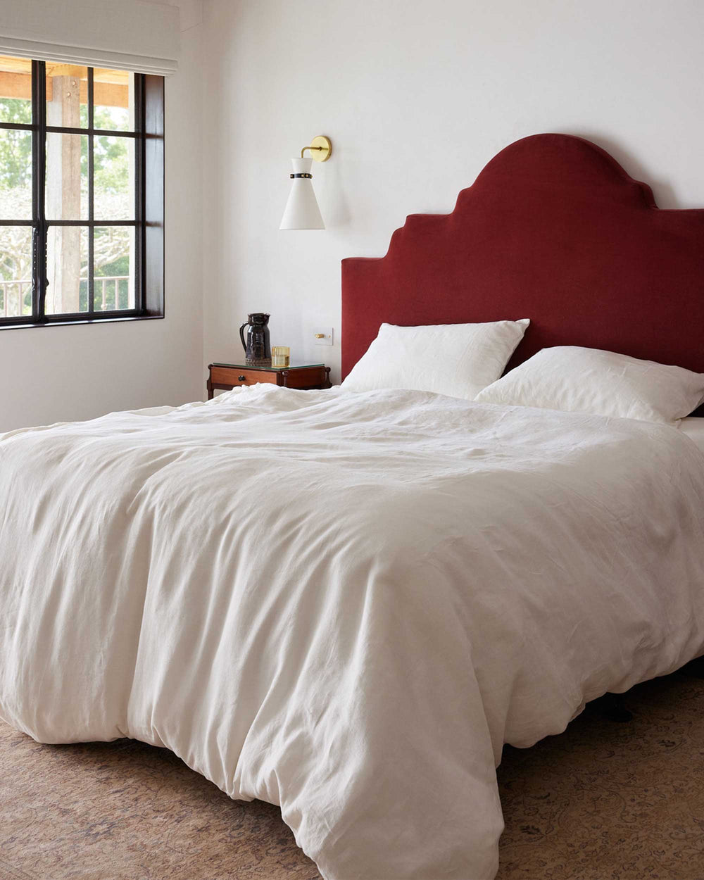 Ivory linen duvet cover by CULTIVER, featuring a soft, textured bed linen design perfect for a cozy bedroom setting.