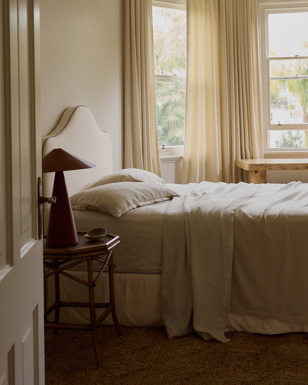 Light oatmeal CULTIVER 100% NZ Merino Wool blanket folded neatly, showcasing its soft, cozy texture and high-quality craftsmanship.