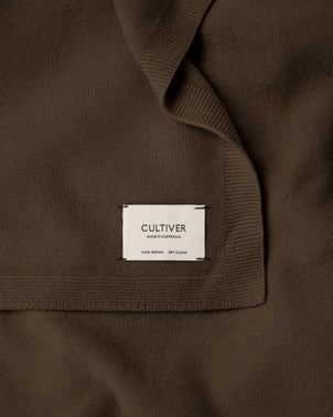 files/CULTIVER_100__ZQ_Merino_Wool_Blanket_TRUFFLE-Label.jpg
