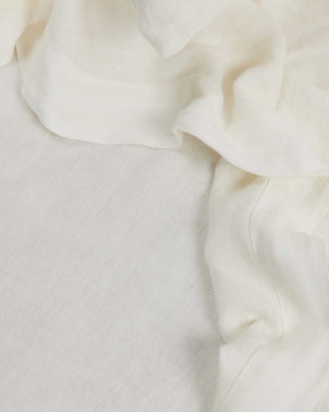 Cultiver Ivory Swatch Card showcasing fabric color and texture for luxury textile and home decor projects.
