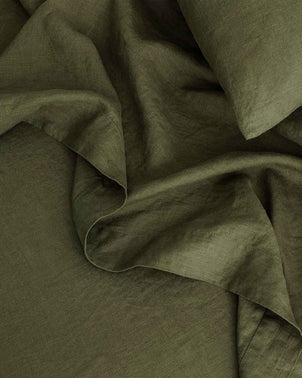 Cultiver Forest Swatch Card featuring natural green fabric sample with textured weave, perfect for interior design projects.