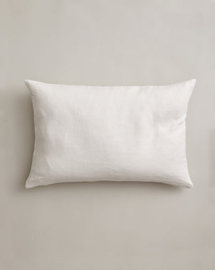Ivory heavyweight linen rectangular cushion cover by CULTIVER, showcasing a soft woven fabric with a clean, modern design.
