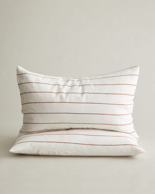 Set of 2 CULTIVER linen pillowcases with cedar stripe pattern, featuring soft fabric and stylish design for bed linens.