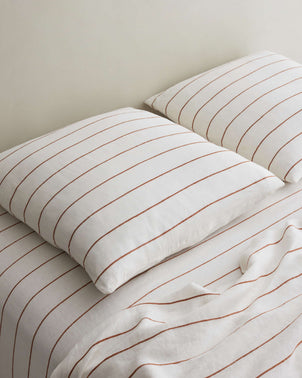 files/Pillowcases_Euro_Cedar_Stripe_Styled_on_Bed.jpg