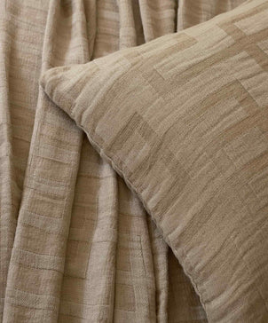 files/Rolfes_Throw_Cushion_Natural_closeup_ea3ce60c-cfda-4e59-821a-bd8f1f3532a0.jpg