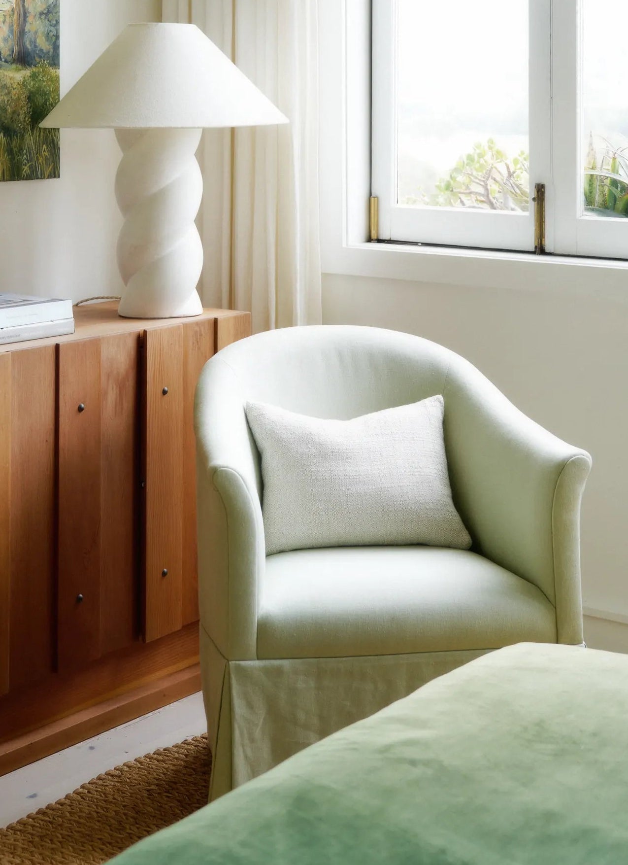 Bed with brown bedding and headboard in a bedroom setting