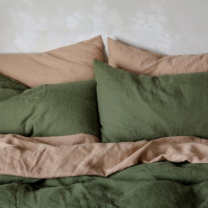 A bed dressed in Fawn and Forest bed linen