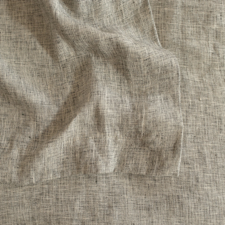  A close up of the Chambray Heavyweight Bedcover in Black