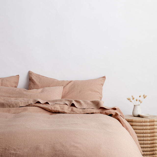 A bed dressed in Fawn bed linen