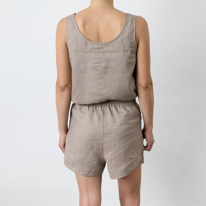 Back view of Piper Linen Short in Clay. Model is also wearing the matching Piper Linen Singlet in Clay.