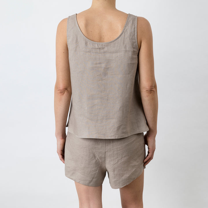 Back view of Piper Linen Singlet in Clay. Model is also wearing the matching Piper Linen Short in Clay.