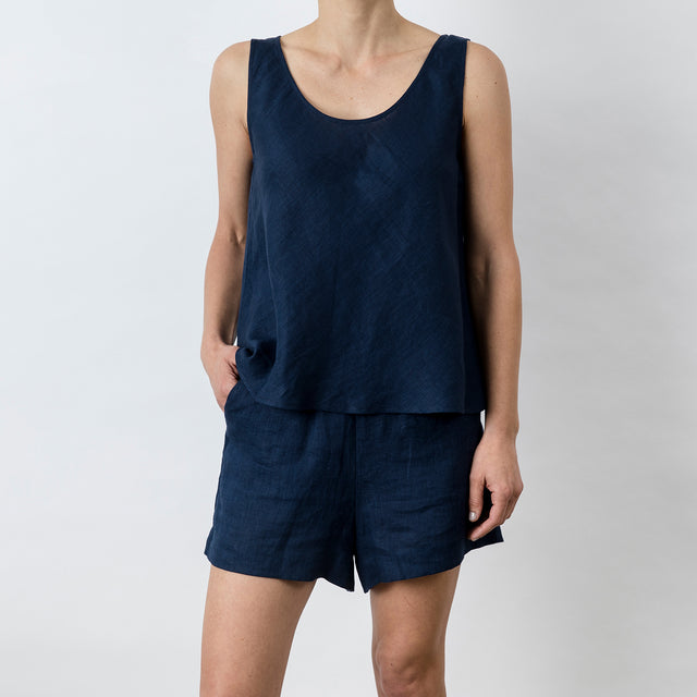 Front view of Piper Linen Singlet in Midnight. Model is also wearing the matching Piper Linen Short in Midnight.