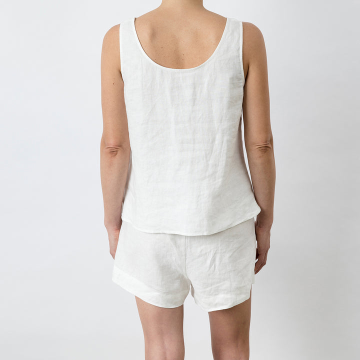 Back view of Piper Linen Singlet in White. Model is also wearing the matching Piper Linen Short in White.