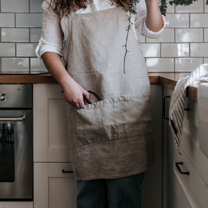 Model wears Jude Linen Apron - Natural