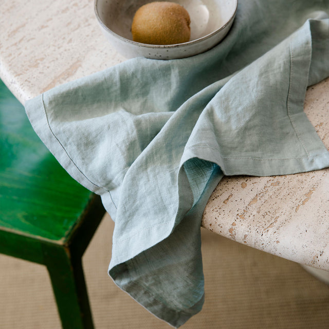 A close up of a Linen Table Napkin in Sage